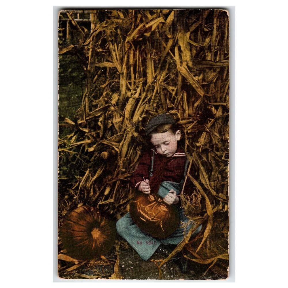 1909 Halloween Boy Carving Jack-O-Lantern Pumpkin Postcard Flint MI